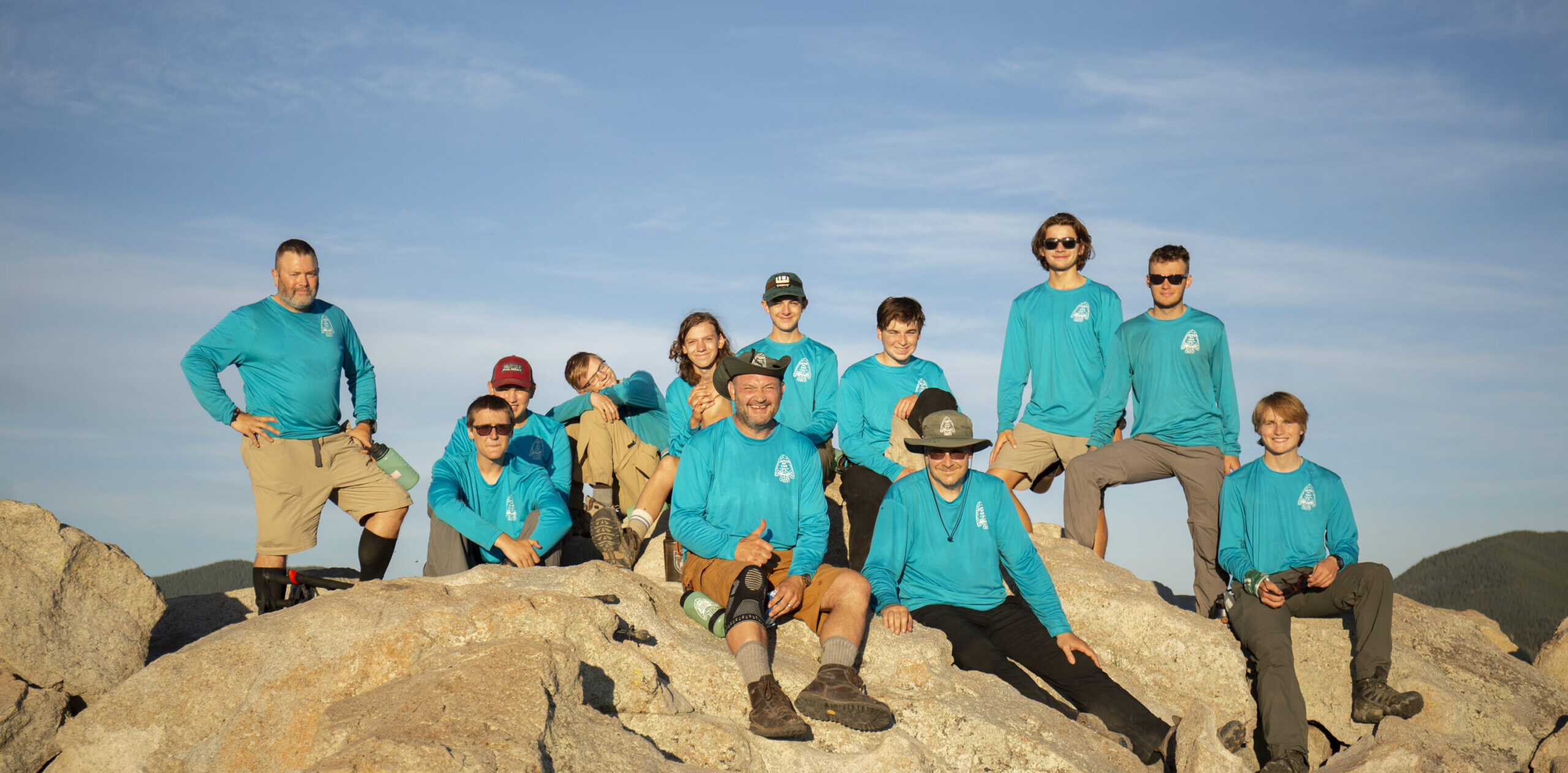 Crew 710-P-02 poses for a portrait at the summit of the Tooth of Time at Philmont Scout Ranch on July 21, 2022 in Cimarron, N.M.