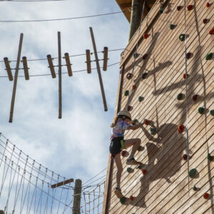 PTC participants and family camp explore the high ropes course at rocky mountain scout camp on 611. bouldering